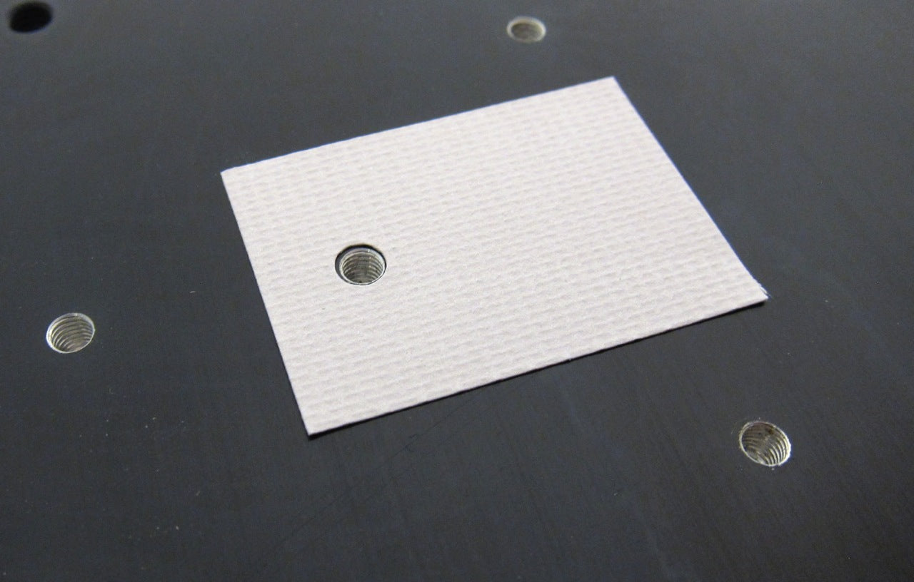 Keratherm applied to a heatsink, ready for a transistor to be mounted on top